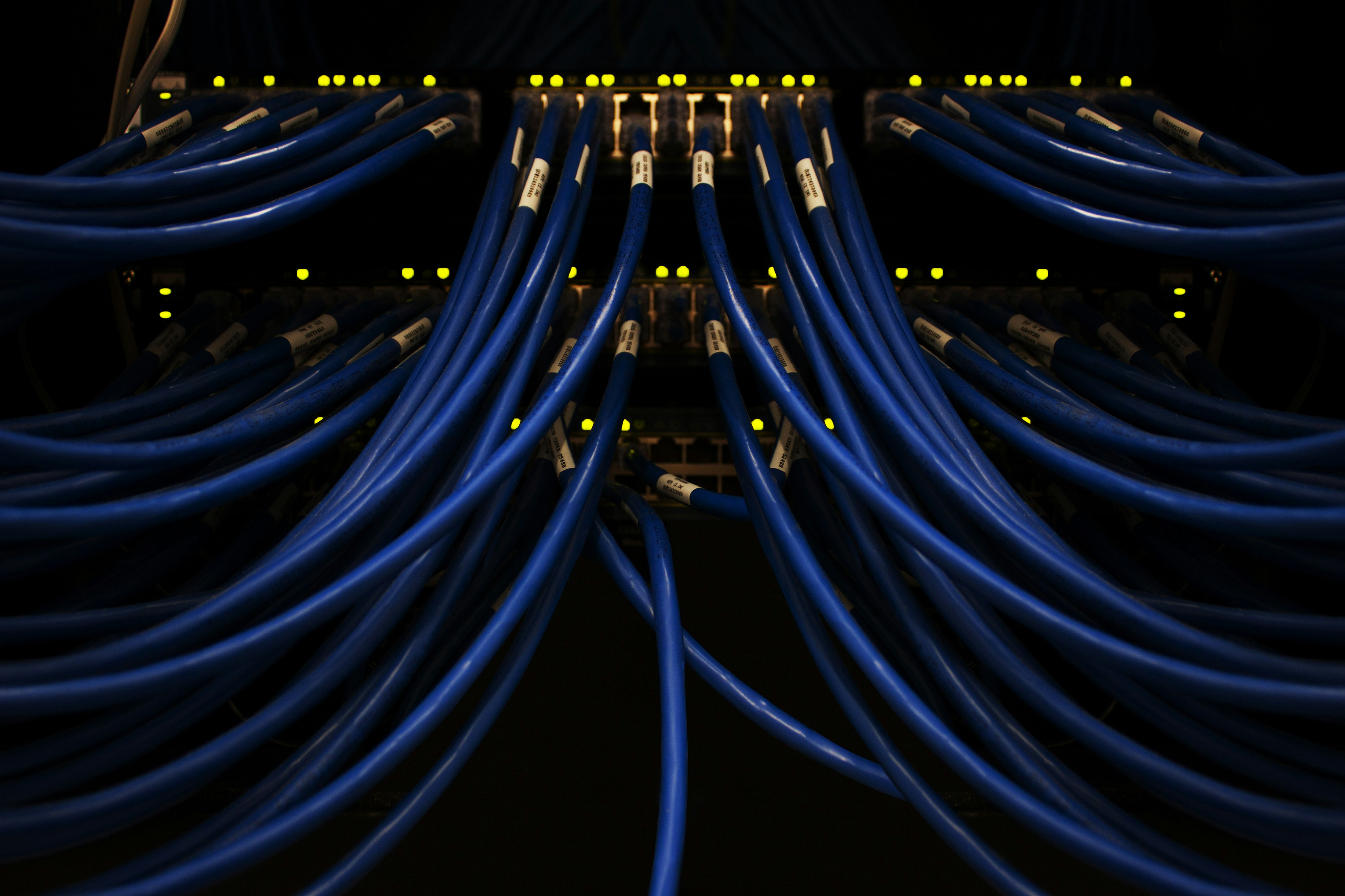 Technician working on network hardware